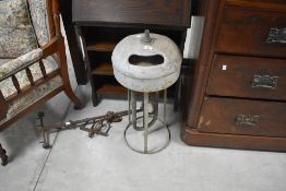 A vintage Lister milk cooler, and other agricultural bygones including meat/game hooks