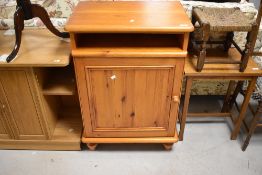 A modern/vintage yellow pine side cabinet of large proportions, dimensions approx. W65 H92 D44cm