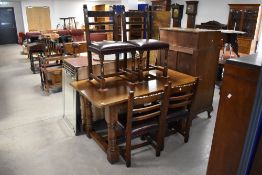 A very nice quality and well proportioned oak reproduction refectory dining table and set of four