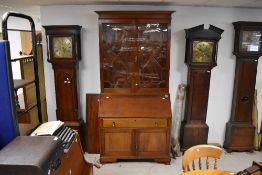 A 19th Century and later mahogany composite bureau bookcase having astral glazed section over drop
