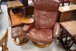 A stressless swivel recliner, in brown leather