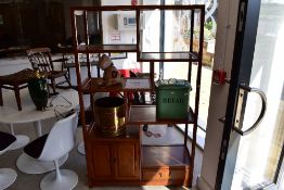 An Oriental hardwood display shelf in the Chinese style , having open shelves and single cupboard