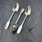 A group of three George III Scottish silver fiddle pattern teaspoons, having 'RGA' initials to