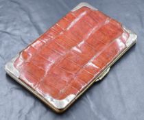 A Victorian Charles Penny Brown silver mounted crocodile skin wallet, of rectangular form having