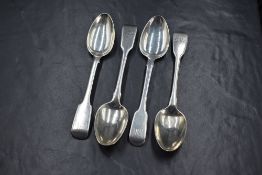 A group of four silver fiddle pattern teaspoons, all having monograms to terminals, marks for London
