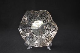 An Elizabeth II silver dish, having a lobed rim with decorative pierced scroll walls, marks for