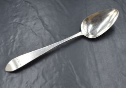 A George III Irish silver Old English pattern serving spoon, having 'S-Mc-B' to terminal, marks