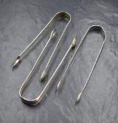Three pairs of Georgian silver sugar tongs, all having initials engraved, marks for London 1799,