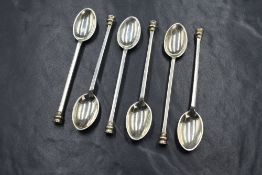 A set of six George V silver coffee spoons, having moulded terminals, marks for Sheffield 1932,