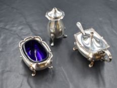 A George VI silver mustard, of rectangular form having a gadrooned and shell rim, with blue glass