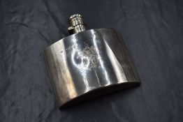 A Victorian silver hip flask, of curved rectangular form having 'SRF' monogram to the centre,
