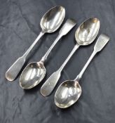 A set of four George IV Irish silver fiddle pattern teaspoons, having a heraldic crest of an