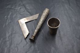 A 20th century silver vesta and wax seal, having ornate floral scroll decoration to the body with