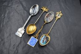 A group of four silver souvenir spoons, comprising Southampton, Malta, Ragusa and Elizabeth II