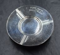 An Elizabeth II silver pedestal dish, having a wide flared rim with geometric decoration and