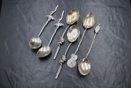 A pair of white metal teaspoons, having lily-pad motif bowls with waterlilies to the terminals ,