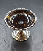 A George V silver and tortoise shell pedestal bon bon dish, the bowl of tortoise shell having a