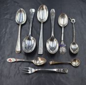 A George V silver Hanoverian rat-tail pattern dessert spoon, having 'MNK 1916', along with seven