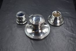 A George V silver inkwell, of circular form having moulded detail to the top and base, marks for