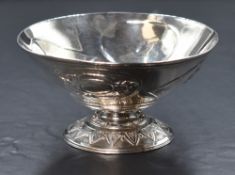 A Victorian silver pedestal bon bon dish, of flared form having embossed scenes to the body,