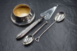 A Victorian silver cake server, having scroll decoration, marks for Sheffield 1877, maker Martin,
