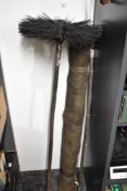 A late 19th to early 20th-century chimney sweep brush kit, to include 2 poles, one large, round