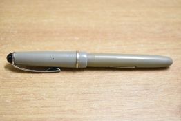 An Osmiroid 65 lever fill fountain pen in Grey with single cap band having Osmiroid Italic Broad