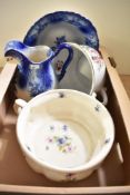 A blue and white vintage water jug and bowl and two chamber pots.