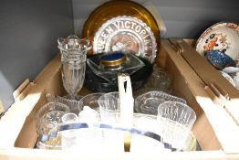 A collection of assorted glassware to include a large amber glass bowl, a green glass fruit bowl and