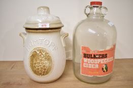 A 20th century West German pottery 'Rumtopf' lidded storage jar featuring a cream coloured glazed