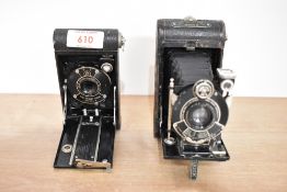 Two folding cameras. A Kodak Vest Pocket Series III and a Kodak Vest Pocket Model B