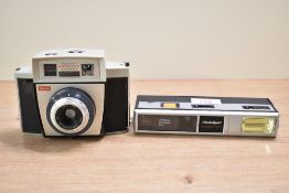 A Photosport Highlite Tele camera and a vintage Kodak Autosnap camera