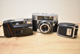 An Agfa camera with Optima Campur shutter and Agfalux flash sells with a Nikon RF camera