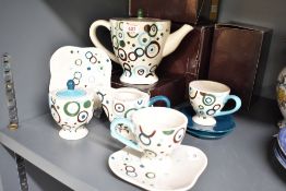 A funky Coffee BAR part tea/coffee service in the Orbit design featuring a distinctive blue and