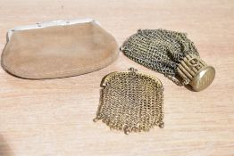 Three antique and vintage purses, two chain link in brass and a tan suede coin purse with white