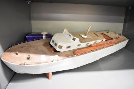 A 20th-century wooden model of a boat, 58cm, condition is consistent with age and use, thought to be