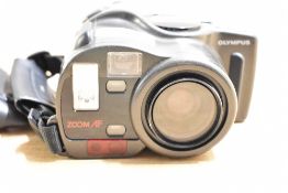 An Olympus AZ-330 Superzoom 35mm camera with fixed Zoom 38-105mm 1:4,5-6 lens in soft camera bag