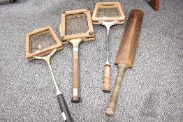 A quantity of 20th-century vintage wooden sports equipment, to include a wooden cricket bat, two