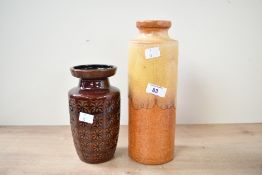 Two 20th-century West German pottery vases, to feature a tall orange example having a drip-glaze and