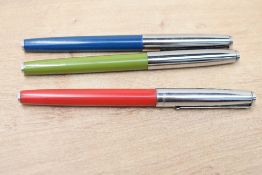 Three Platignum cartridge fill fountain pens in Green, Teal and Red with steel caps. (red has cracks