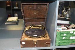 A Vintage Alba Portable model 505 (Five o Five) gramophone, with retailers label for M.A Harding,