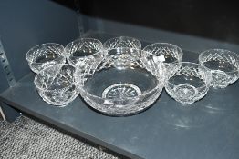 A quantity of 20th-century Stuart Crystal-style cut glass bowls, featuring a diamond-shaped cuts
