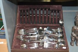 A 20th-century French Guy Degrenne stainless steel cutlery canteen, having forks, knives and