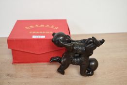 A 20th century Chinese cast and patinated bronze figure group, formed as two young children, the boy