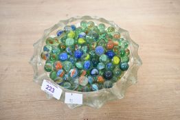 A large selection of 20th-century glass marbles, to feature a variety of styles and colour