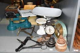 A group of six vintage weighing scales including trones and balances scales, together with two