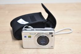 A modern Sony Cyber-shot DSC-W110 digital camera, in a case, sold as seen.