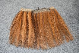 Ethnographic interest* a Papua New Guinea ceremonial grass skirt, with broad woven band, 62cm