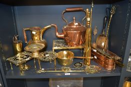 A large selection of late 19th to 20th-century brass and copper wares, to feature a large copper