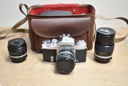 A Miranda RE11 with Miranda EC 1:1,8 50mm lens, a Soligar EC Tele Auto 1:2,8 135mm lens and a